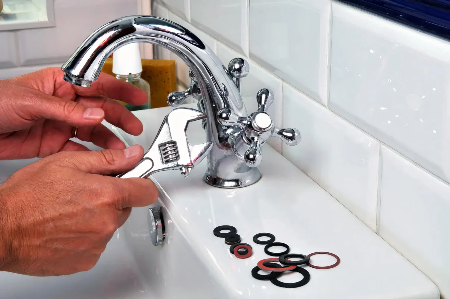 Plumber maintaining a bathroom faucet in Glendale